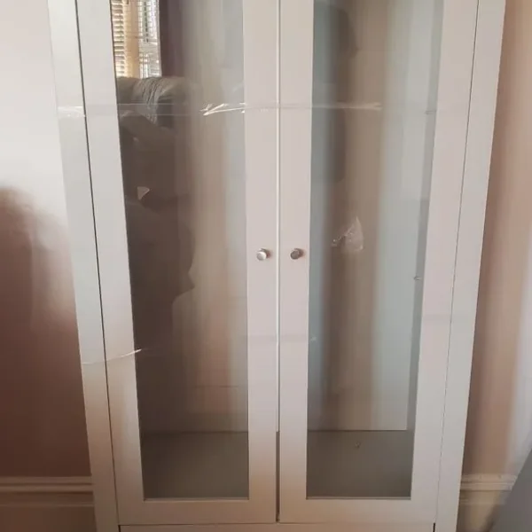 Grey cabinet with glass doors