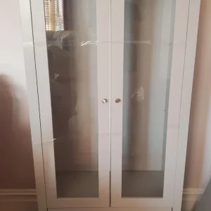 Grey cabinet with glass doors