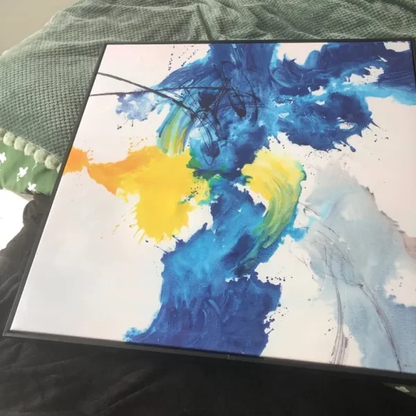 Large canvas abstract art in blue/yellow