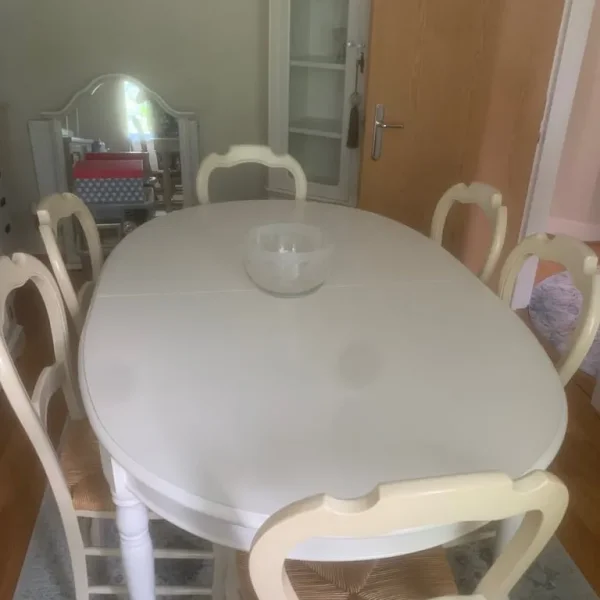 Off white oval table and six dining chairs