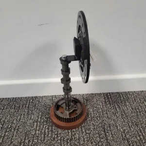 Handmade Clutch Plate Clock on Camshaft with Mahogany Base - Image 5