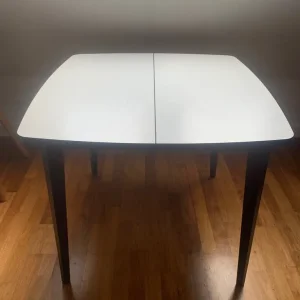 Extending table (with two white chairs)