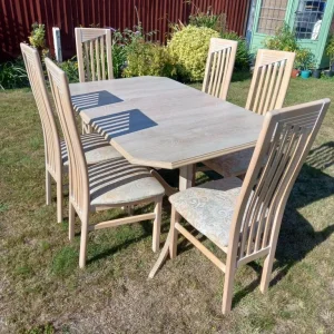 Limed oak extending dining table and 6 chairs