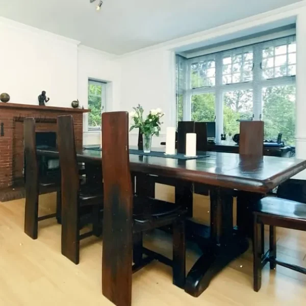 Teak dining table with eight chairs