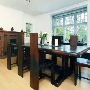 Teak dining table with eight chairs