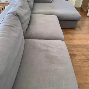 Large light gray chaise sofa