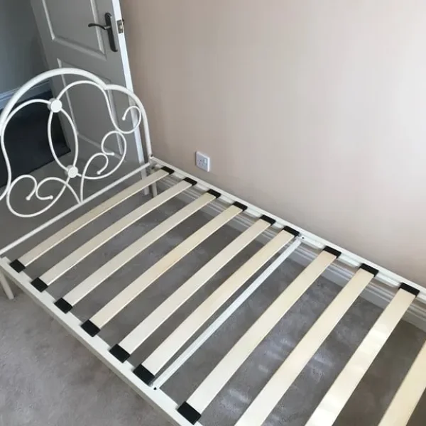Period metal single bedstead in antique cream