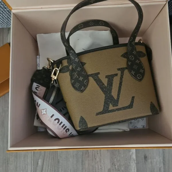 Woman's handbag used once boxed