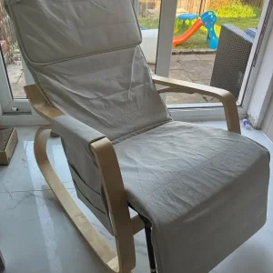 Rocking chair with leg raising option