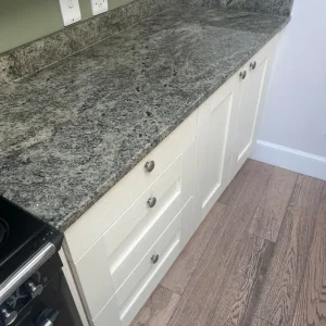 Kitchen worktops sink and cupboards - Image 2