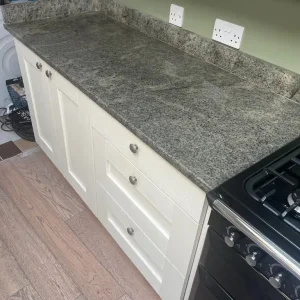 Kitchen worktops sink and cupboards - Image 3