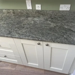 Kitchen worktops sink and cupboards
