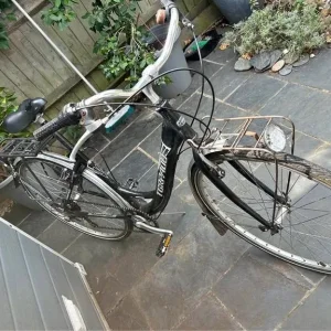 Lady’s black Torpado bike