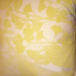 TWO YELLOW DUCK FEATHER CUSHIONS