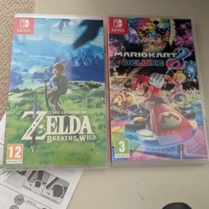 Nintendo switch w/mario kart 8 & zelda breath of the wild - Image 2