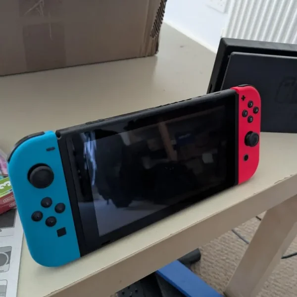 Nintendo switch w/mario kart 8 & zelda breath of the wild