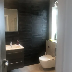 Large bedroom with fitted wardrobes and dressing table - Image 6