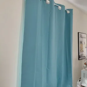 Blue metal eyelet curtains