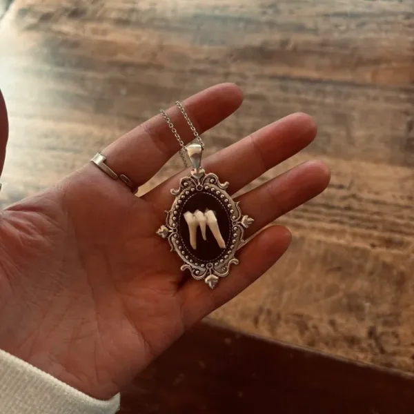 Tooth pendant necklace