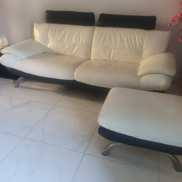 2 x 3 seater leather sofas plus foot stool
