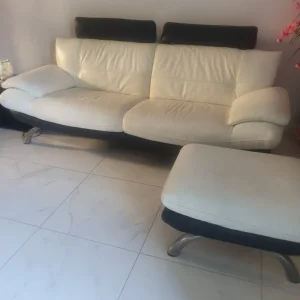 2 x 3 seater leather sofas plus foot stool