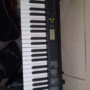 Casio CTK-240 Electronic Keyboard with Stand and Sheet Music - Image 5