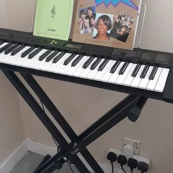 Casio CTK-240 Electronic Keyboard with Stand and Sheet Music