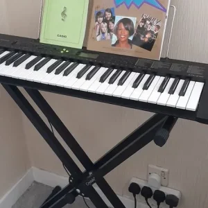 Casio CTK-240 Electronic Keyboard with Stand and Sheet Music