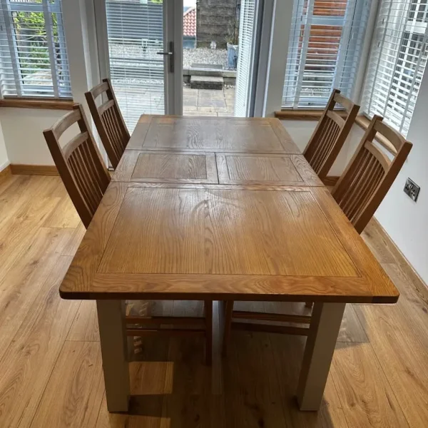 Solid oak extending dining table and 4 chairs
