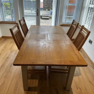Solid oak extending dining table and 4 chairs