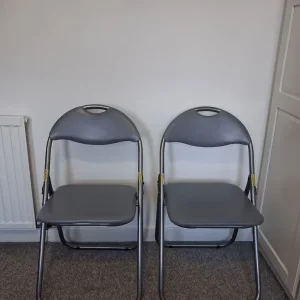 Two Semi-new Folding Chairs