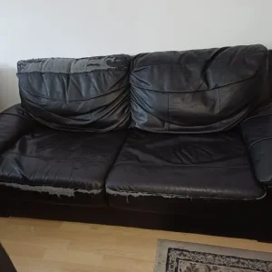 Set of 2 black leather 3-seater sofas with 1 sofa bed