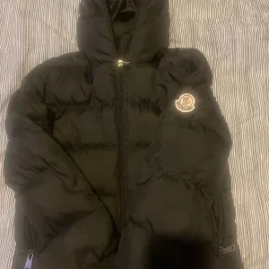 2 girls Moncler jackets