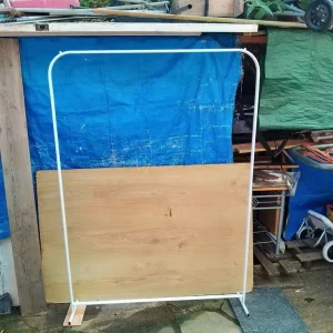 White hanging clothes rail