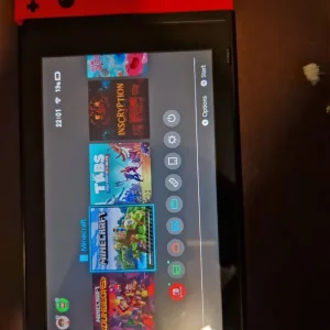 Nintendo Switch with digital games and carry case - Image 3