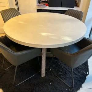 Round concrete effect dining table