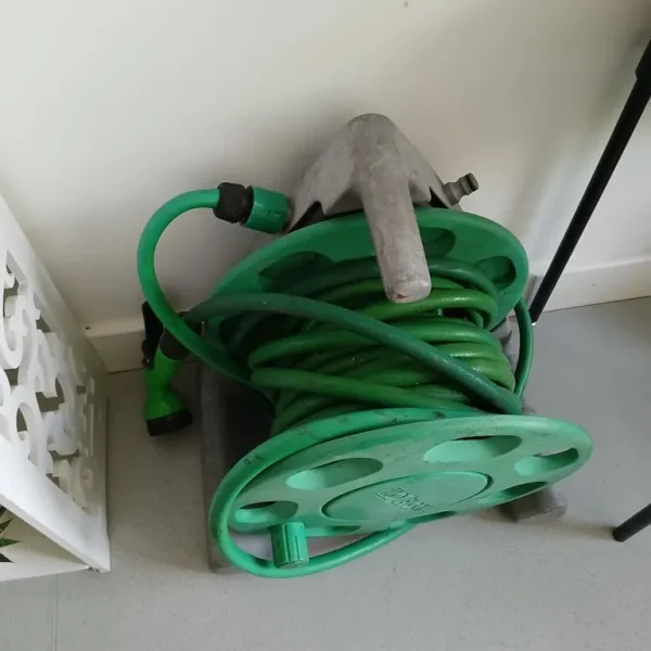 Hose on wheel holder