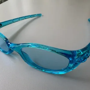 Vintage Oakley Sunglasses – Light Blue Wrap-Around - Image 2