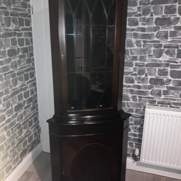 Living room unit with glass shelves and lockable doors