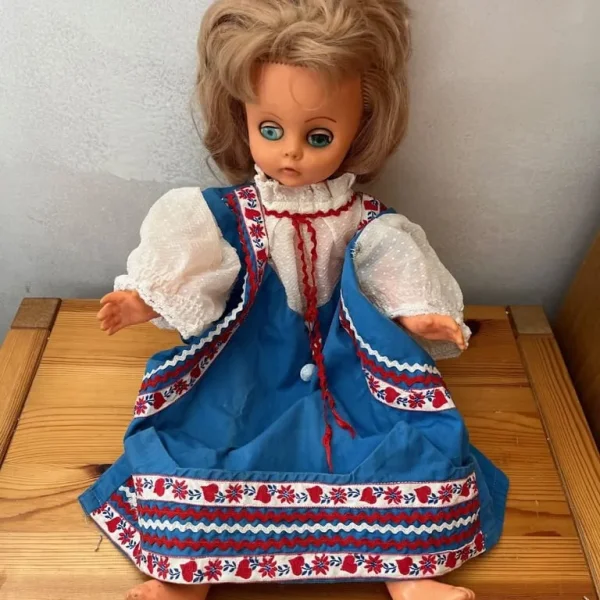Vintage 1970s play doll in a pretty blue dress