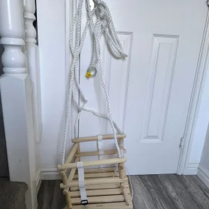 Wooden kids swing