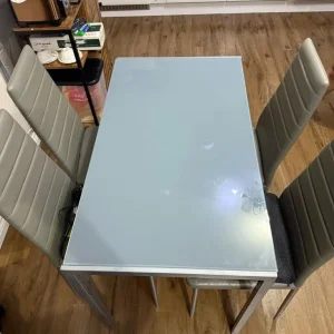 Glass Dining Table with 4 Faux Leather Chairs