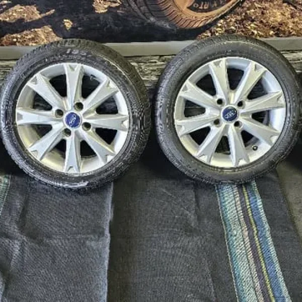 Ford Genuine 15 alloy wheels with 4 tyres