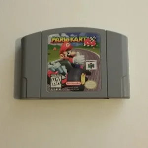 Nintendo 64 with cables, controller, and two Mario games