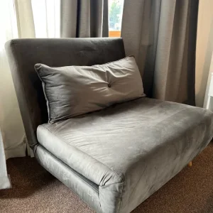 Love seat that folds into a single bed