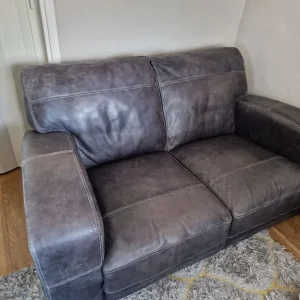 Distressed real leather sofa