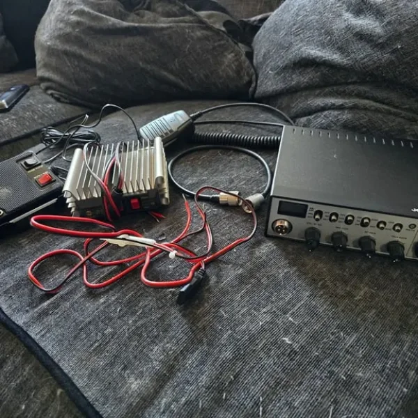 CB radio setup with amp and antenna