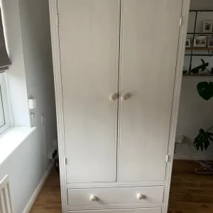 white wooden wardrobe