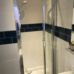 Mira Flight shower tray 730mm x 730mm with bifold glass door