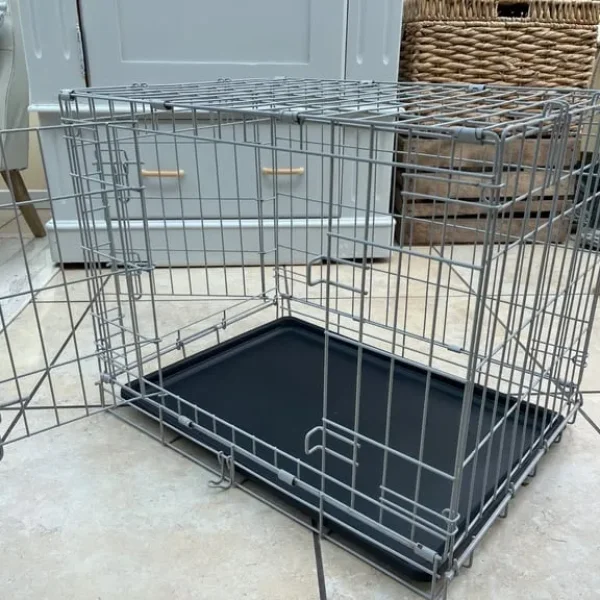 Dog crate with removable waterproof tray